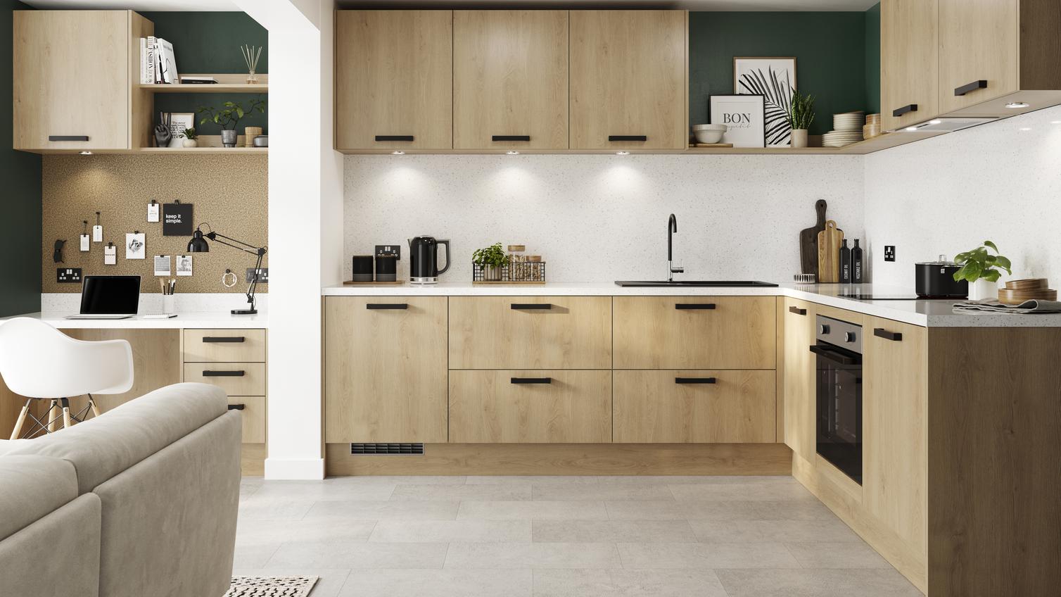 Natural oak l-shape kitchen with white kitchen worktops, black handles, and downlights. Includes an adjoining office space.